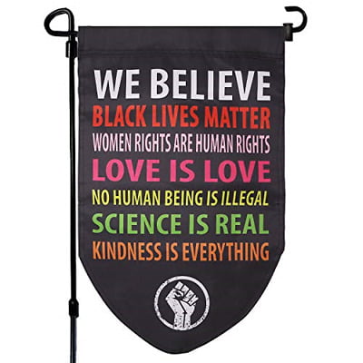 Flag with the words: "We Believe Black Lives Matter, Women Rights are Human Rights, Love is Love, No Human Being is Illegal, Science is real, Kindness is Everything."